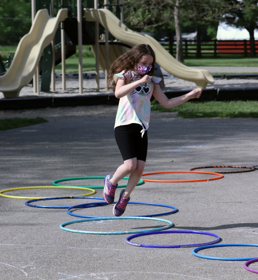 photo of student jumping